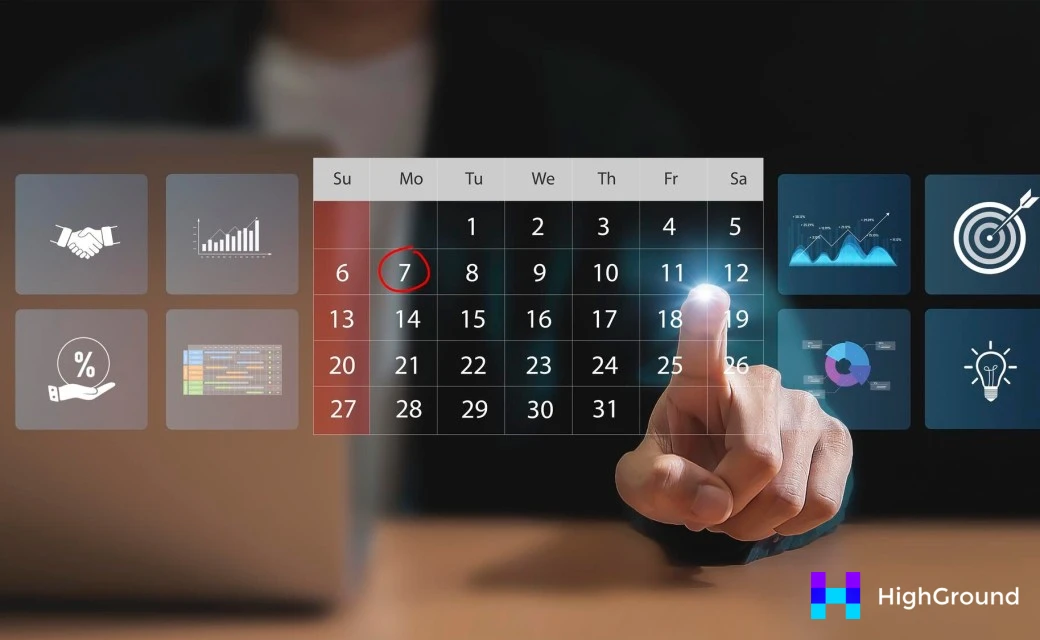 Person planning content calendar on laptop